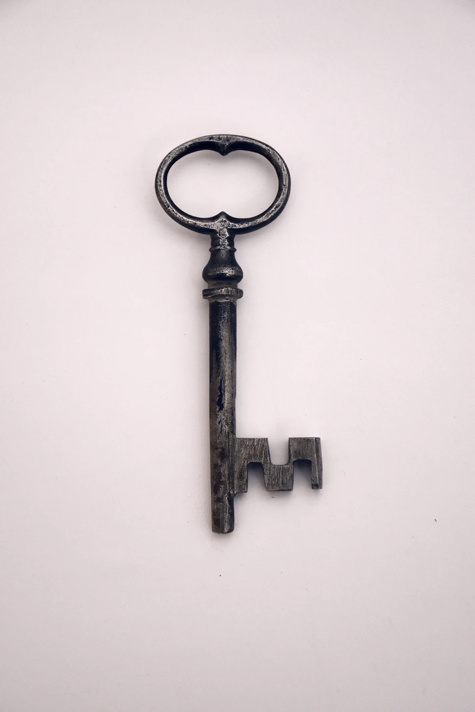 Black and silver skeleton key